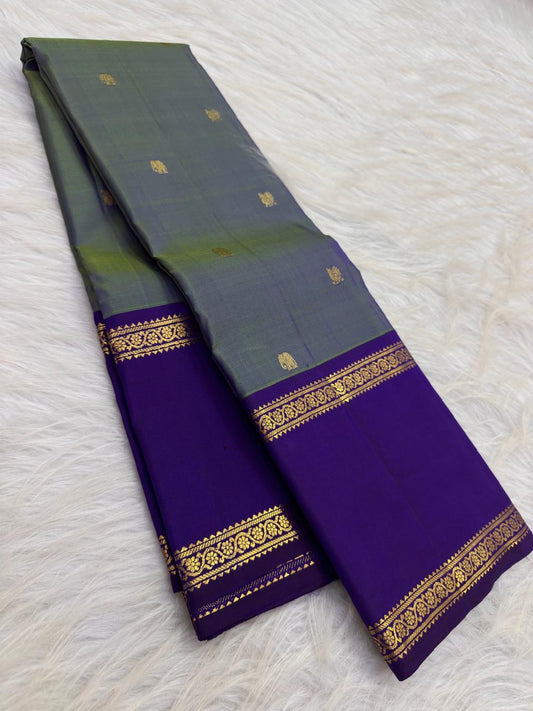 Handwoven shot silk Kanchipuram saree with Mayil and Yaanai zari motifs