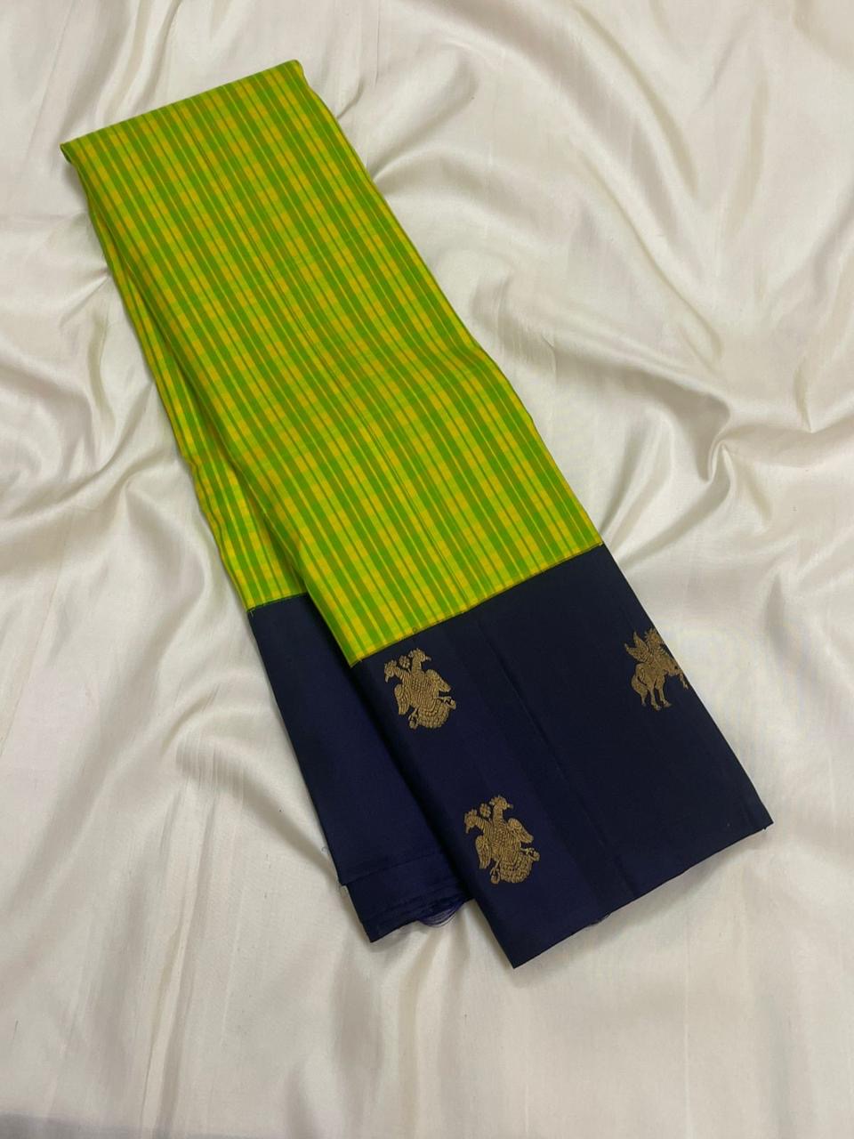Navy pallu with Gandaberunda and Kudhirai butta on lime green Kanjeevaram pure silk saree — pallu close-up