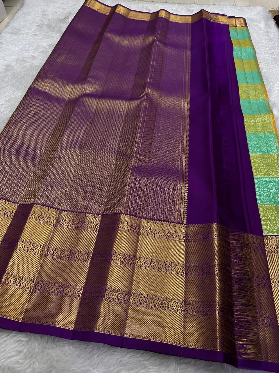 Saffron silk Bomkai panel with animal and floral figurals woven in gold zari — KanchiPattu close-up