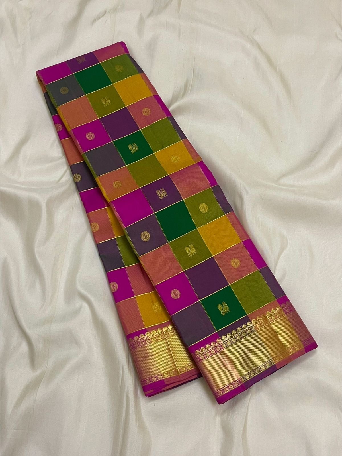 Kamalam lotus butta gold zari detail on magenta Korvai border of multicolour Paalum Pazhamum KanchiPattu saree
