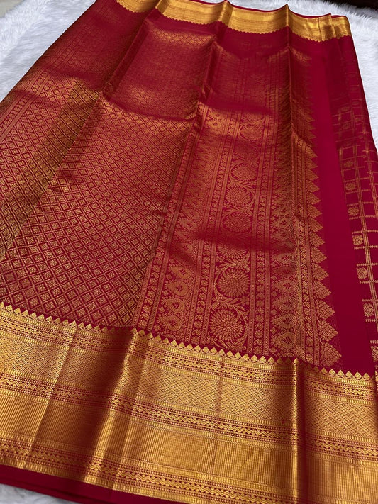 Close view of Zari Kattam body showing Gandaberunda Butta on arakku red Kanjeevaram silk