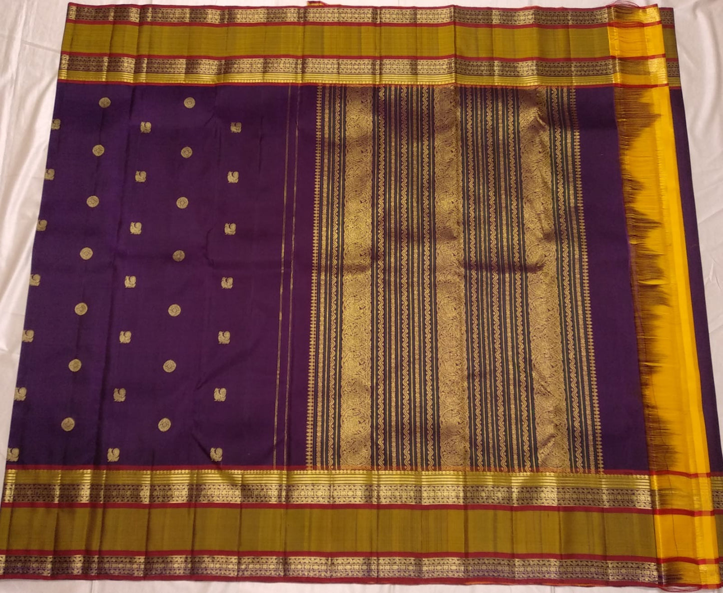 Ponvandu muted yellow korvai border with rettapet gold zari lines and veldhari silk thread work on aubergine purple saree — Idam Living