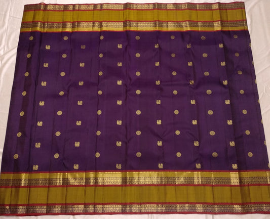 Sorgavasal mayil peacock motifs in dense gold zari pallu on aubergine purple Kanchipuram silk saree — Idam Living