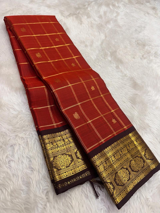 Brick red pure silk saree body close up view