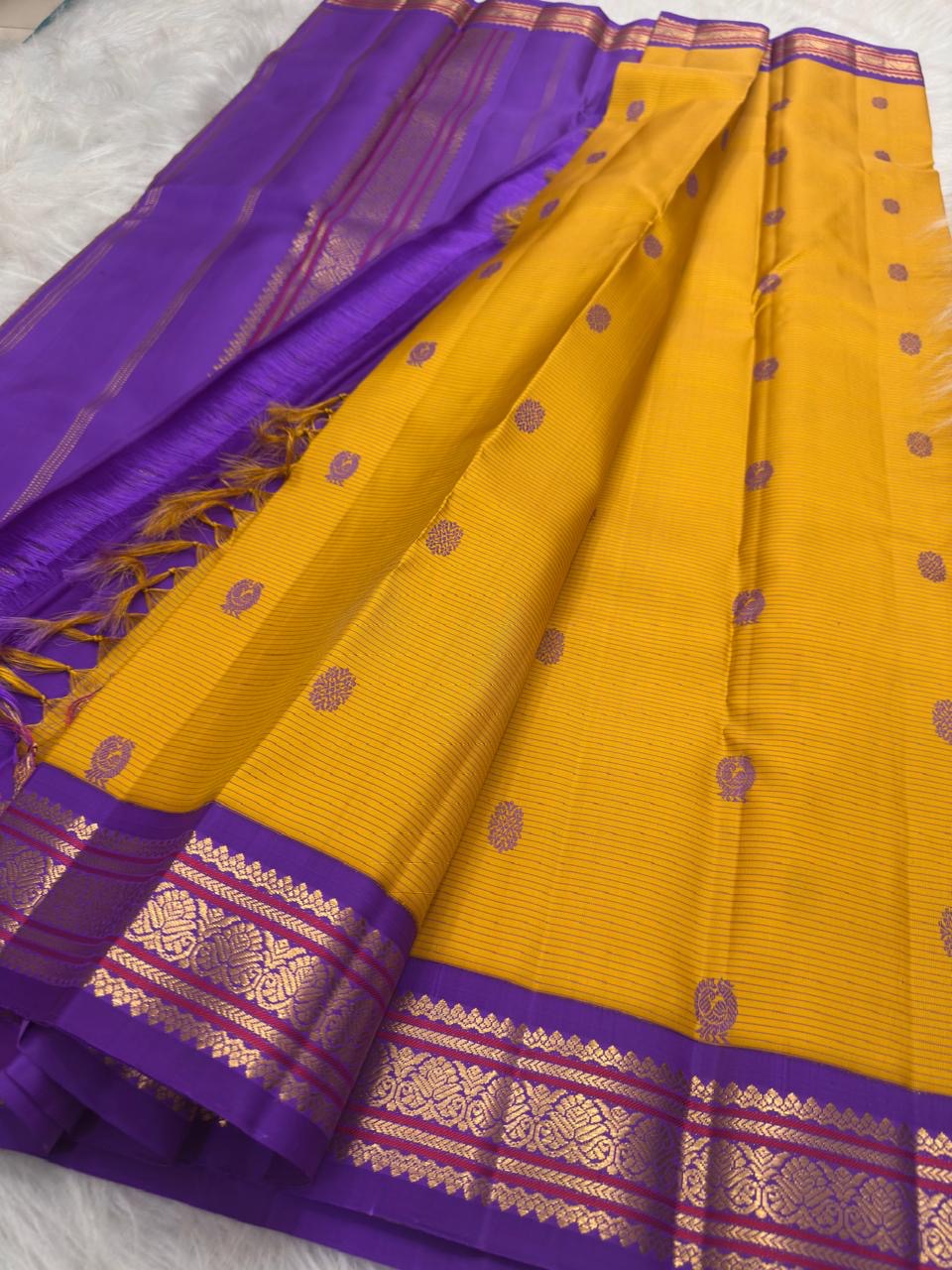 Full drape of brick red pure silk Kancheepuram saree