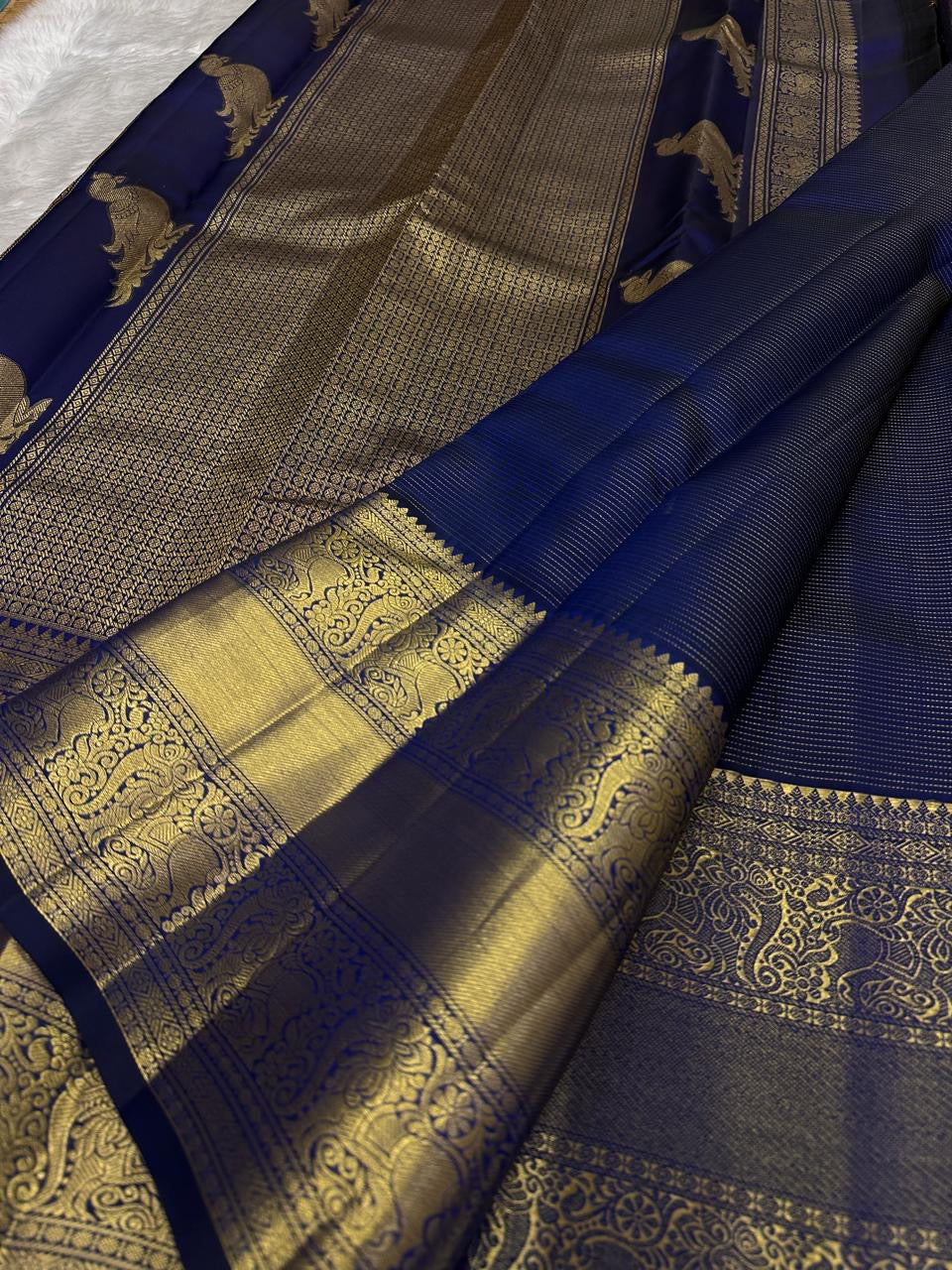 Deep blue Kanjipuram pure silk saree with Zari Kattam weave and Yazhi Kili border — Idam Living