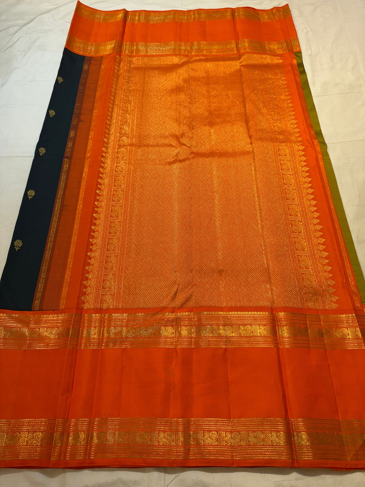 Deep Forest Green and Radiant Orange Pure Silk Kanchipuram Rettapet saree