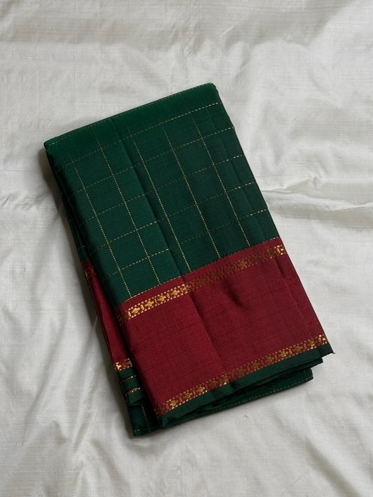 Open saree view highlighting the evenly spaced gold check grid across Deep Forest Green silk