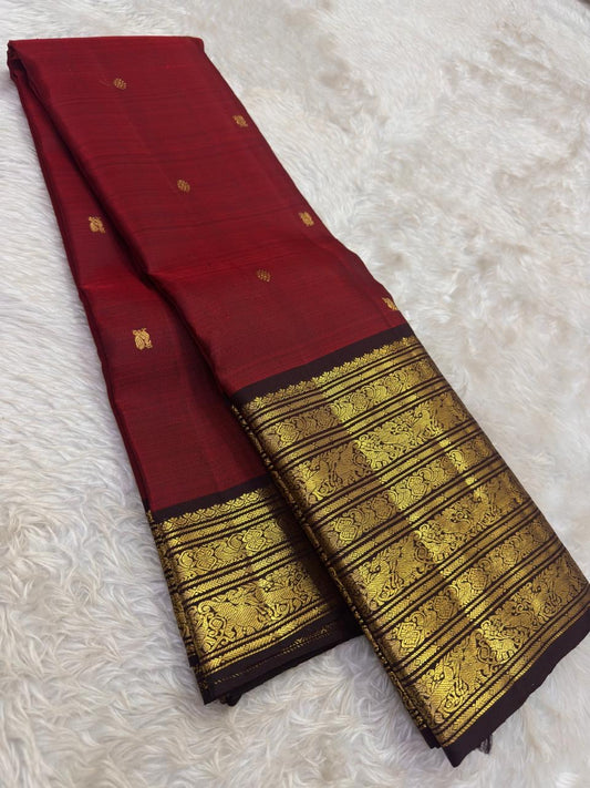 Pure Kanjivaram silk saree with antique gold zari and richly woven brown border