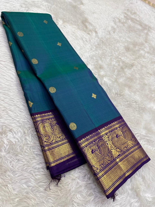 Kanchipattu silk saree in korvai with deep teal blue border weave traditional zari detail