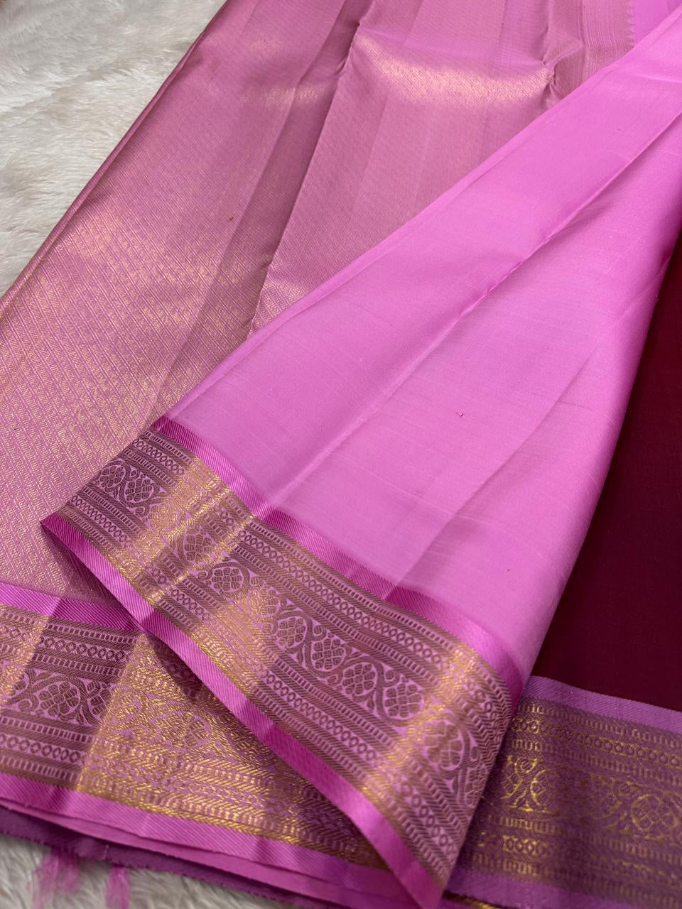 Double-colour Kanchipuram saree shifting from pink to Arakku and muted violet