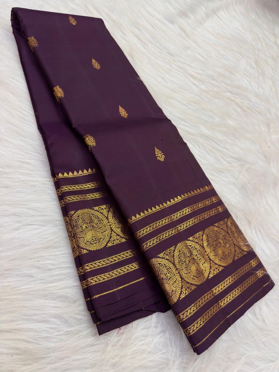 Dusky Aubergine Handwoven Pure Silk Kancheepuram Saree with Mayil Zari Buttas and Antique Pon Zari Border