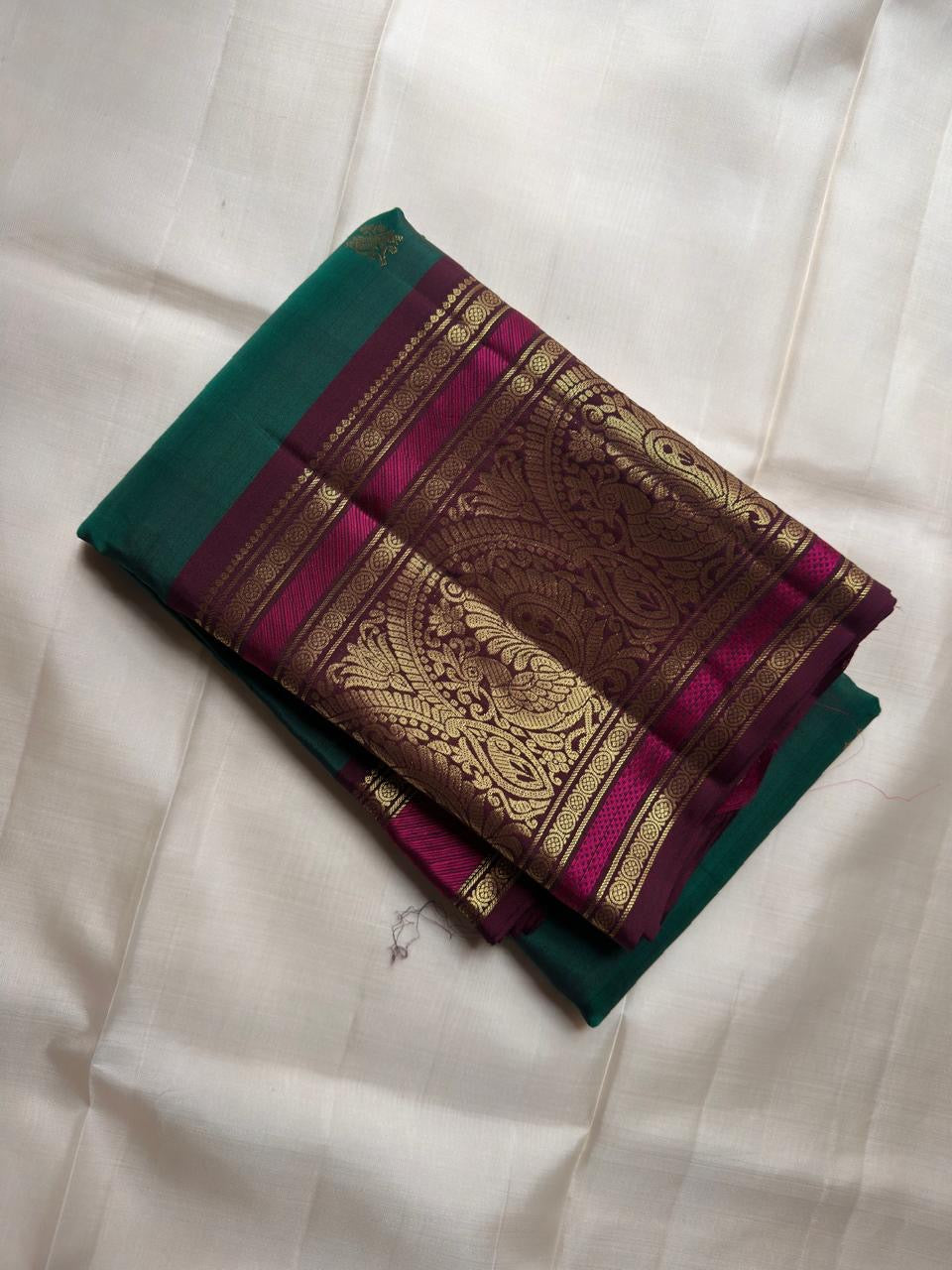 Emerald Green Handwoven Pure Silk KanchiPattu Saree with Magenta Border