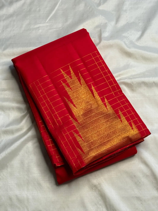 Ettukol zari temple geometry on red Kanjivaram saree