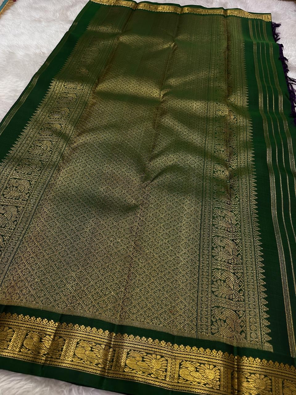 Forest Green Kai Korvai border with rich traditional gold zari motifs
