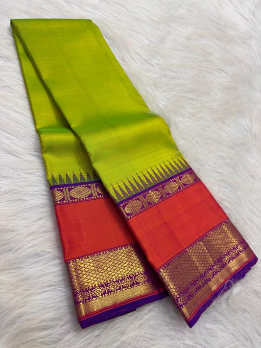 Full view of green vintage-style Kanchipuram saree with stacked seer and seepu reku pallu.