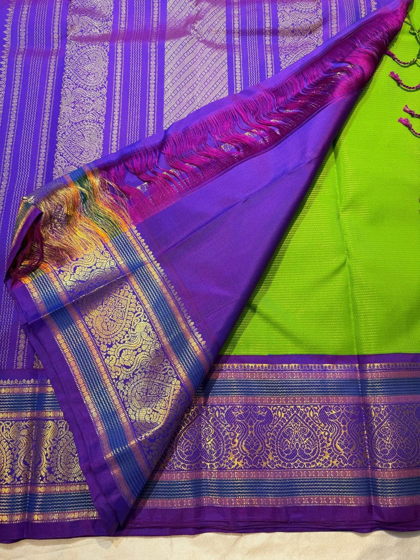 Royal Purple Korvai pallu with antique-gold paisley-inspired zari motifs.
