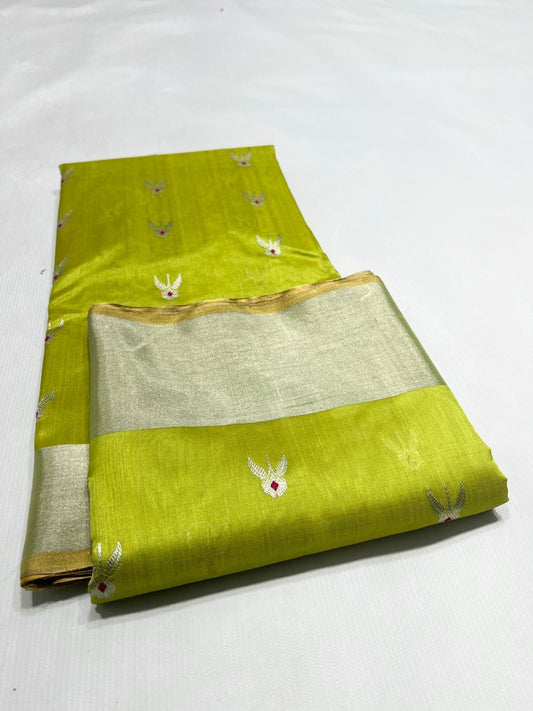 green chanderi silk saree body closeup with small floral butti