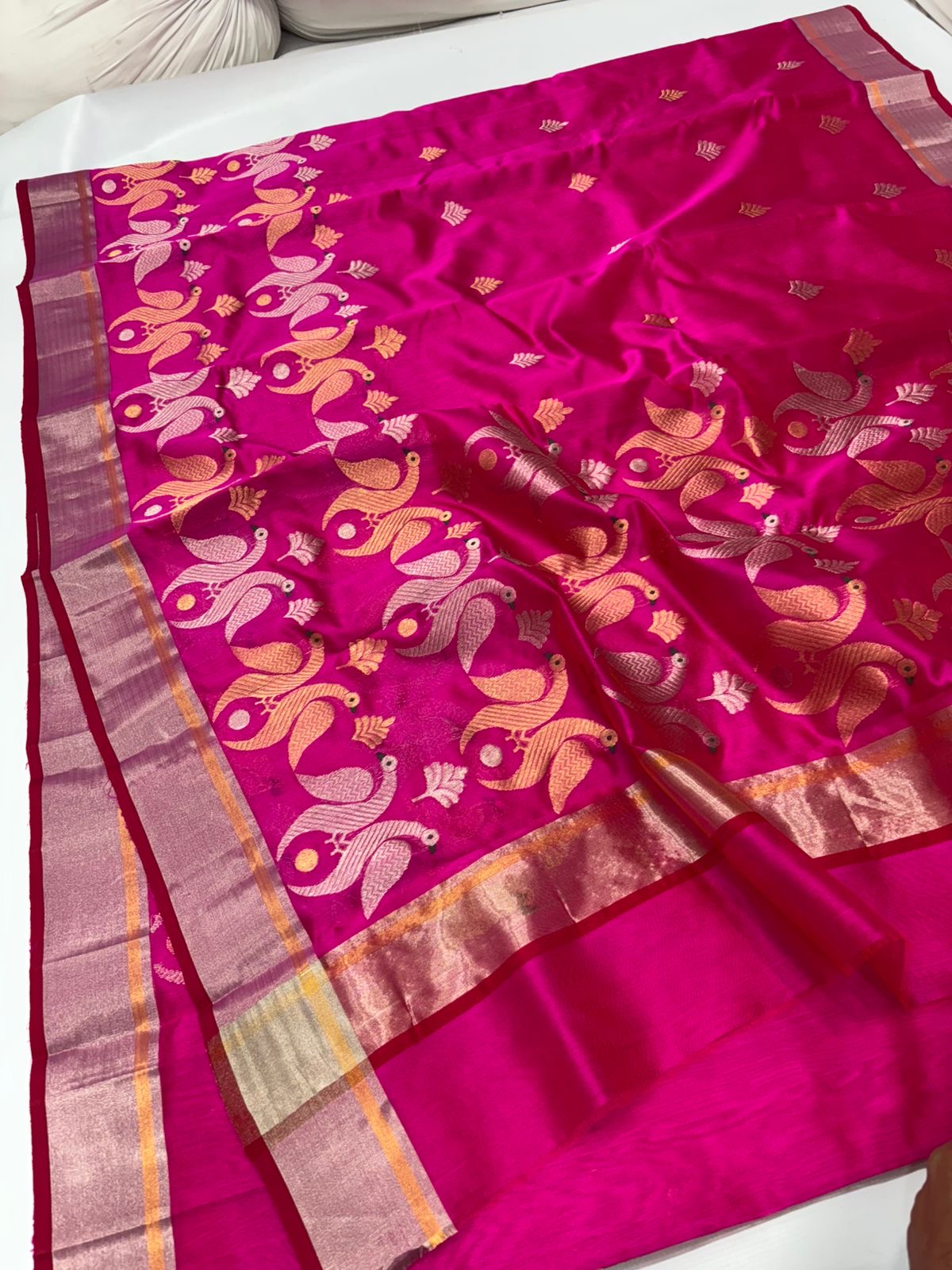 Pure Silk Chanderi with warm and pale metallic peacocks