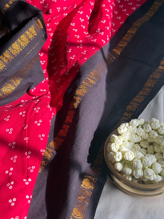 Authentic Madurai Sungudi handloom cotton saree with traditional wax-resist pattern — full view