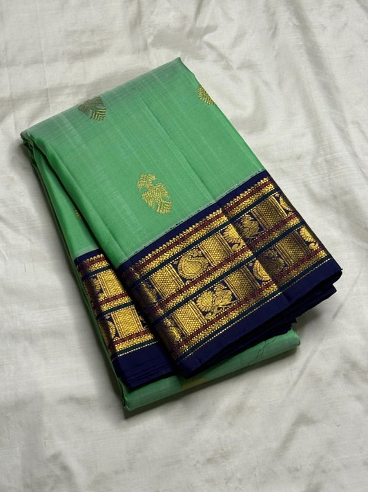 Gold zari mayil peacock butta on jade green korvai Kanchipuram silk saree body — Idam Living