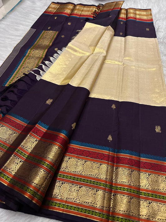 Traditional Annapakshi motif woven in gold zari on tissue Kanchipuram saree