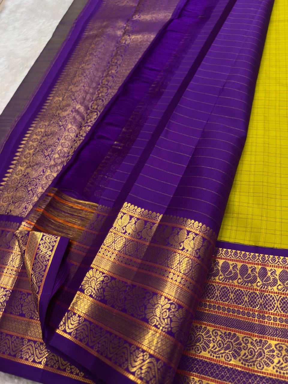 Handwoven pure silk Kancheepuram saree in leaf green with royal purple Varisaipet border — Idam Living
