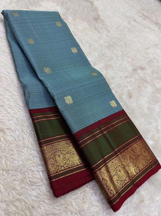 Steel Blue and Deep Green Handwoven Pure Silk Kanjipuram Saree with Mayil Butta and Peacock Silk Thread Zari Border