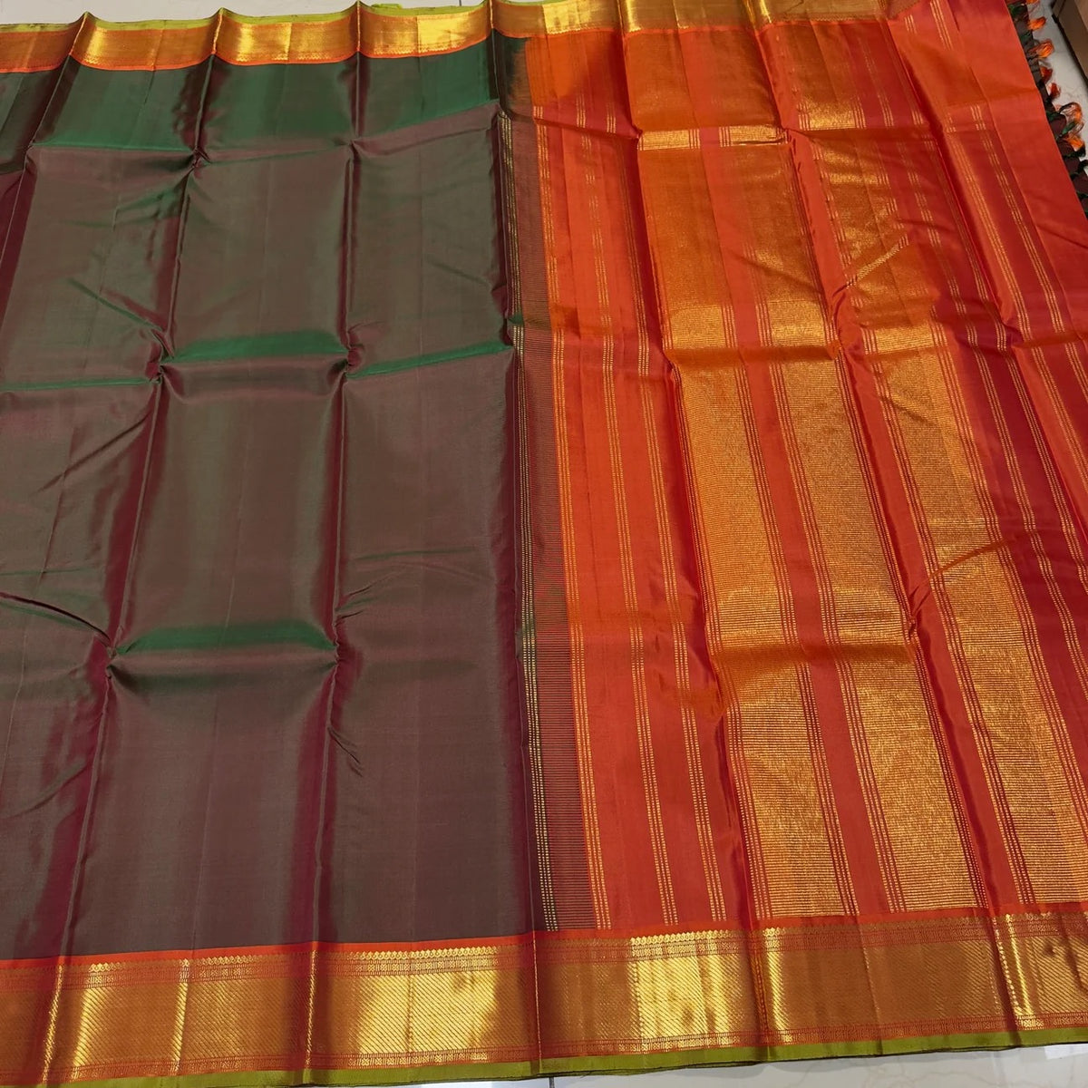 Manthulir green and kesari orange handwoven pure silk Kancheepuram saree with bawanchi borders, view 6
