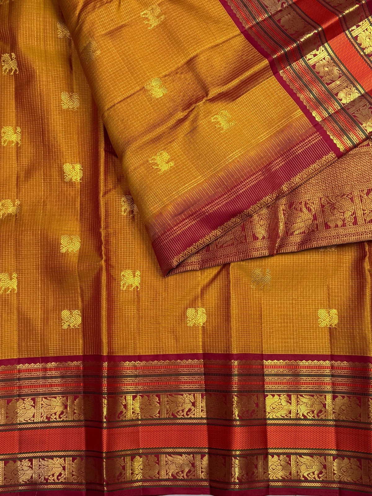 Handwoven Kanchipuram Zari Kattam saree in Honey Brown with Arakku Red with distinctive traditional silk colouring