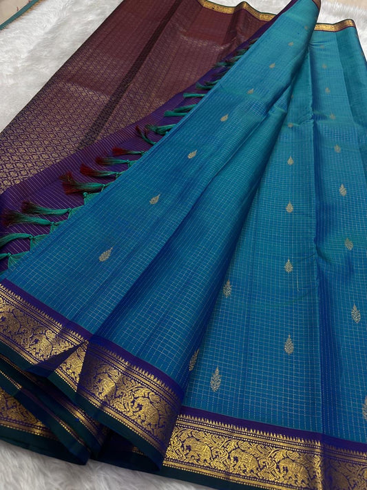 Blue pure Kanchipuram silk saree with traditional gold zari kattam checks