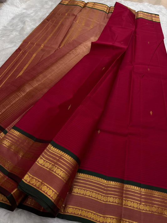 Deep Red and Black Handwoven Pure Silk Kanchipuram Saree with Gold Zari Band Border.