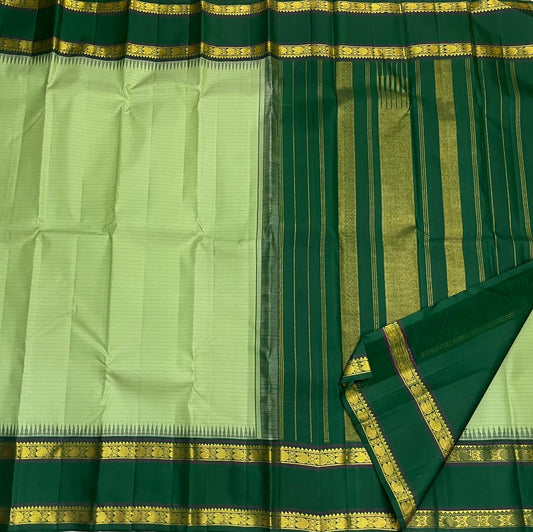 Pure Kanchipuram Silk Saree Sage Green and Dark Green with Traditional Gold Zari Border draped view