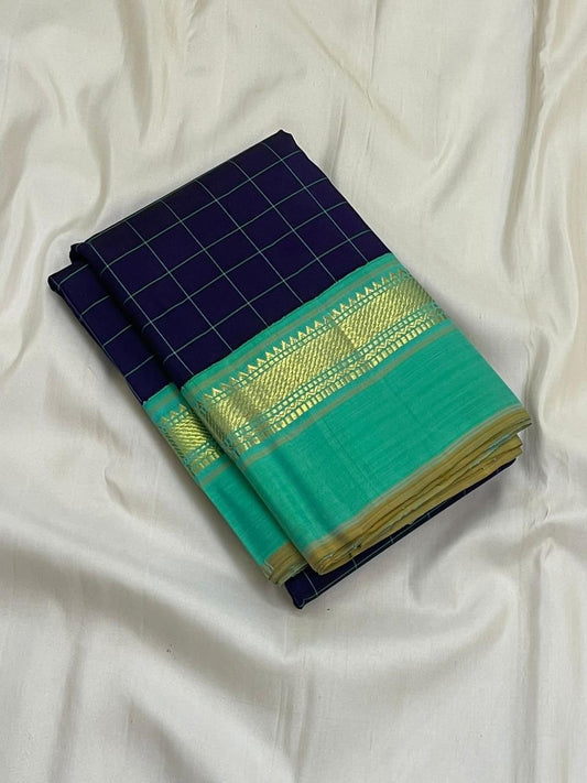 Traditional Kanchipuram silk saree featuring shimmering shot colour silk body