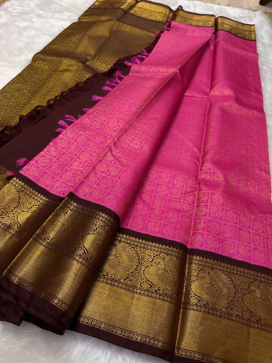 Saree with pink and brown colors on a white background