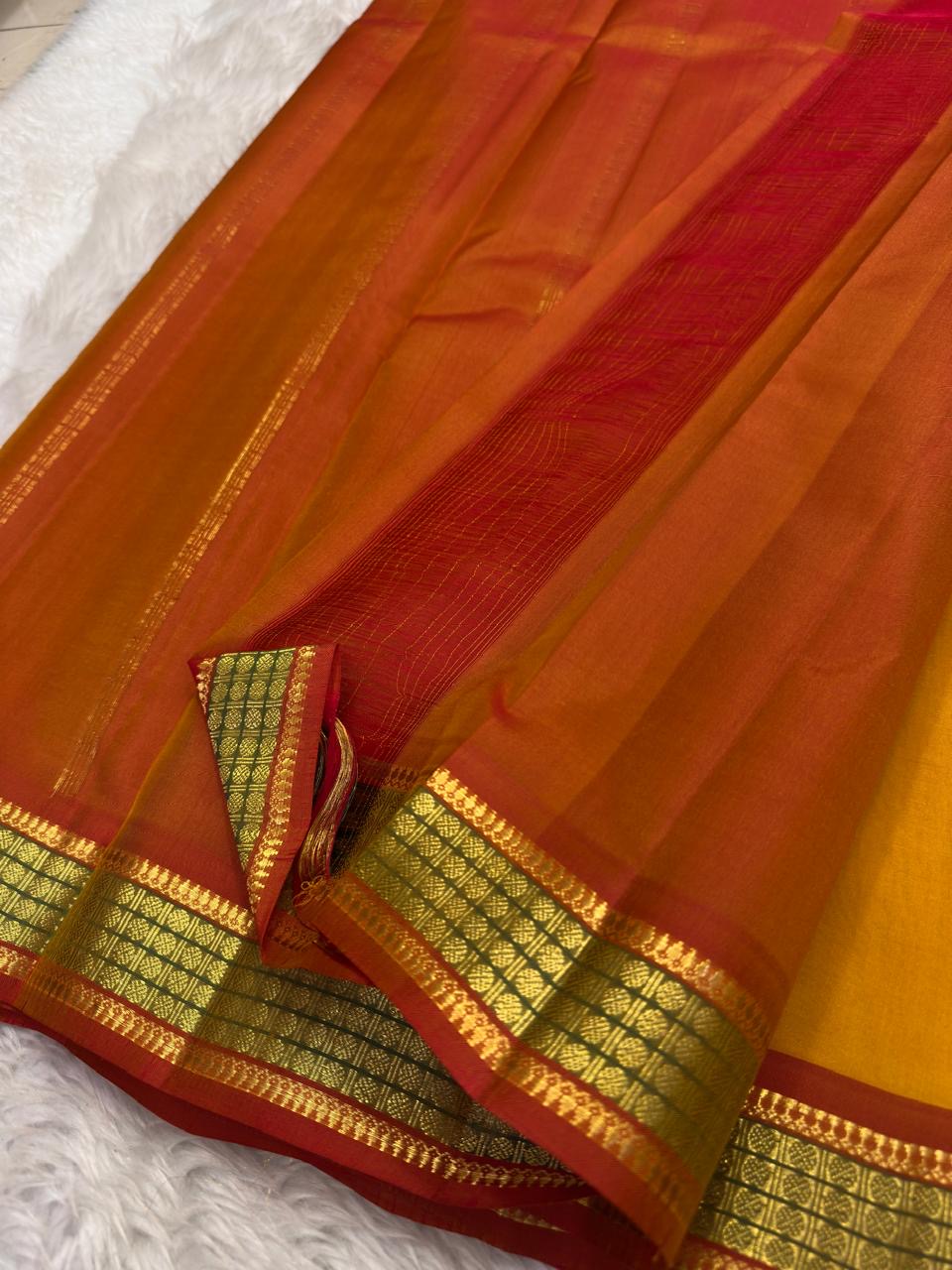 Mustard and Rust Handwoven Pure Silk Kanchipuram Saree with Gold Zari Band Border.