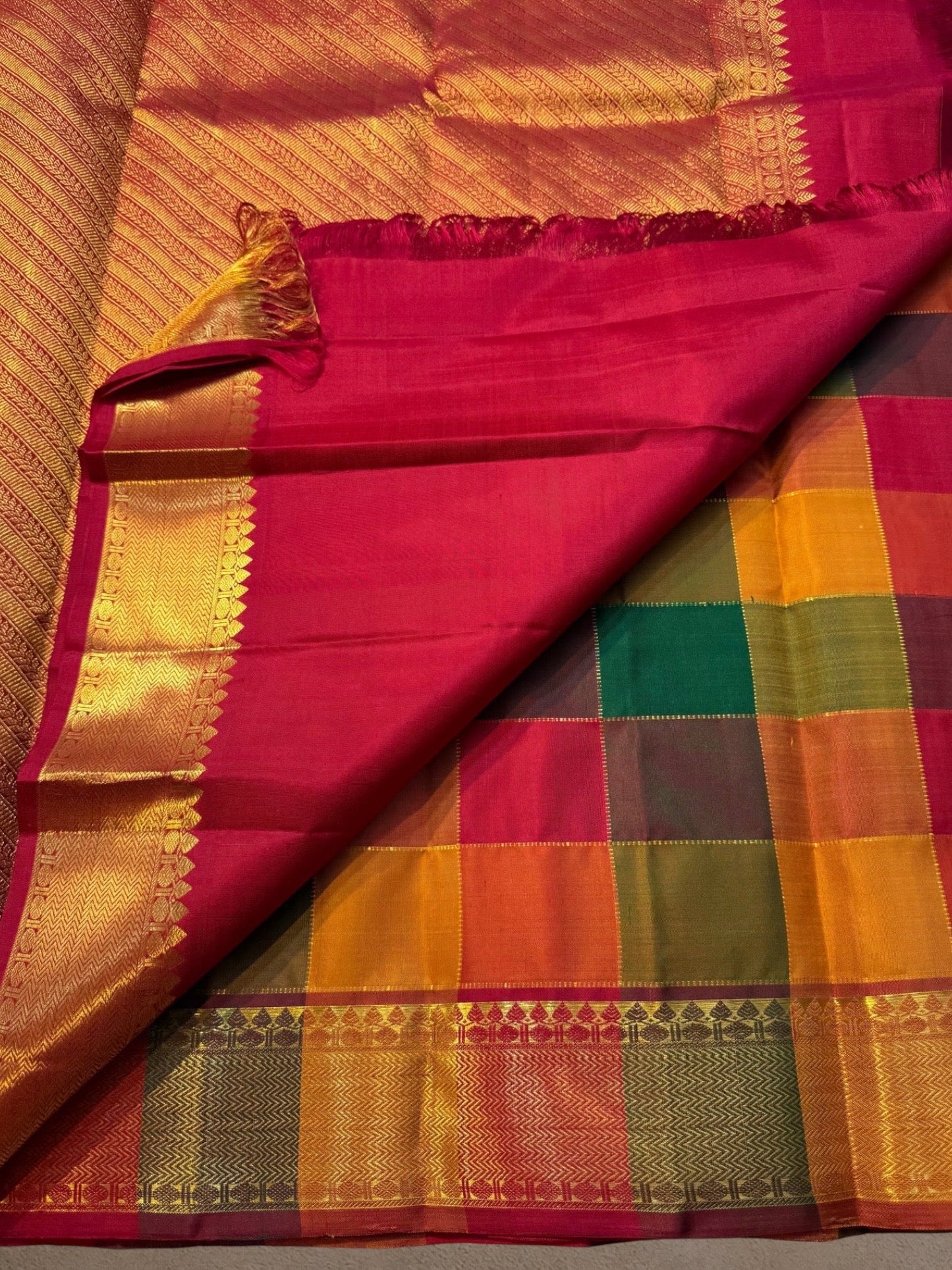 Rich zari pallu pure Kanchipuram silk saree pallu detail with red contrast border