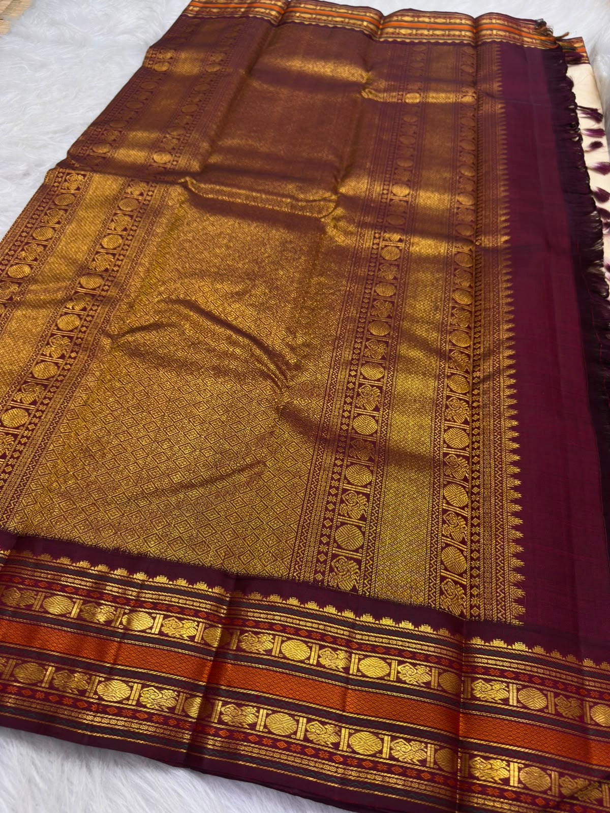 Warm-ivory pure silk Kanjivaram Korvai saree, folded view — Idam Living