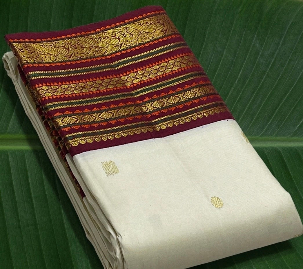 Kanchipuram silk saree in ivory with maroon border Korvai Varisaipet weave folded view