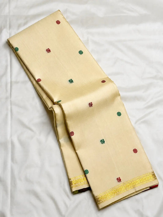 Pure mulberry silk Kanchipuram saree with small multicolour silk-thread motifs.