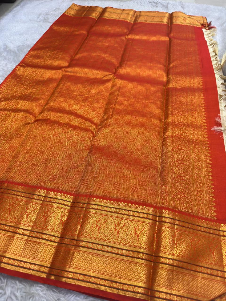 Maanga Butta in gold zari within Kanchi Kattam stripe grid on ivory Zari Kattam body