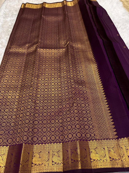 Kanchipattu silk saree in jamun purple with antique gold border Maanga Butta weave traditional zari detail