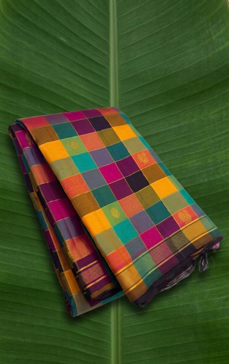 Authentic Kanchipuram silk saree with colourful geometric checks and traditional zari buttas