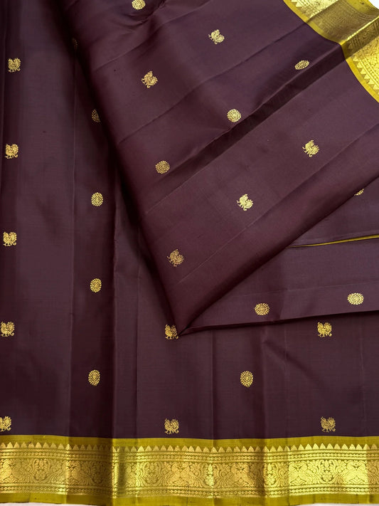 Pure silk Kanchipuram saree in Kaapi Brown with Mehendi Green, traditional handwoven border and zari detail
