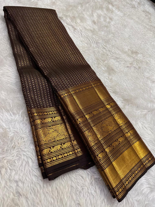 Handwoven Kanjeevaram saree featuring bronze Kanchana brown body with 2 gram zari purity weaving