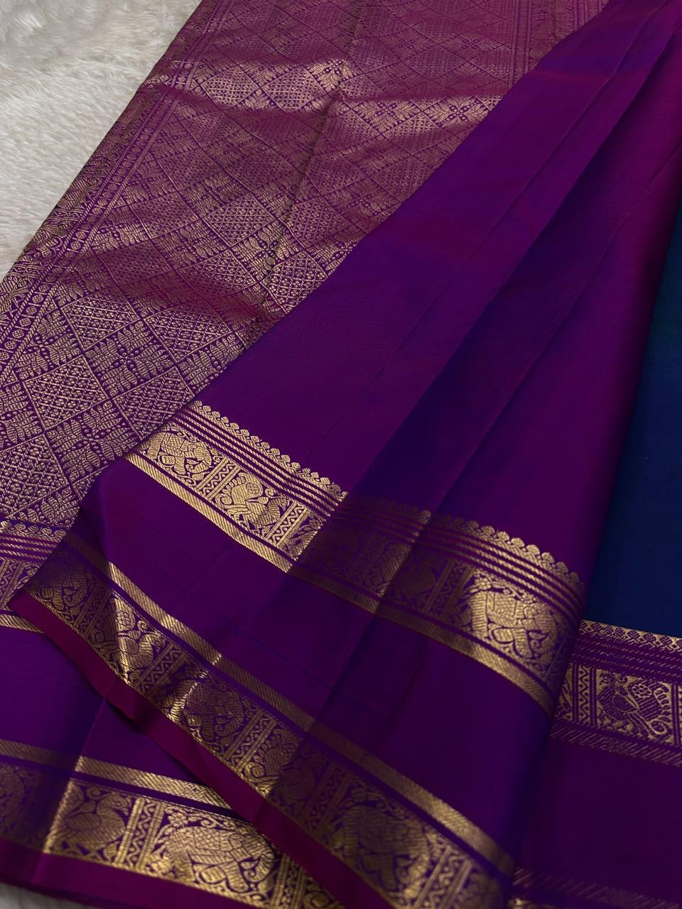 Peacock blue and magenta handwoven pure silk Kanchipuram Rettapet saree — close view of the pallu