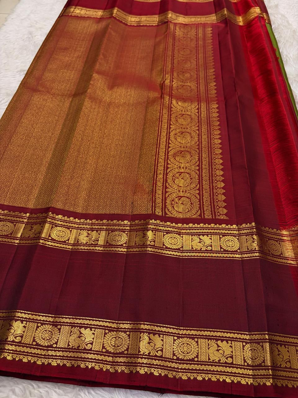 Rich temple motif gold zari pallu of handwoven olive green Kanchipuram pure silk saree — Idam Living