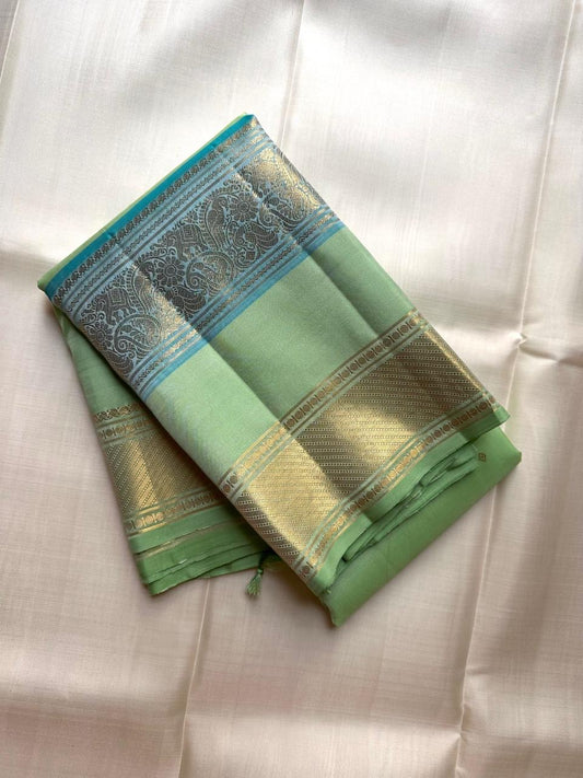 Pistachio Green Handwoven Pure Silk Kanjipuram Saree with Rettapet Twin Border Weave
