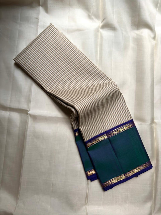 Kancheepuram silk saree beige check pattern with green blue border