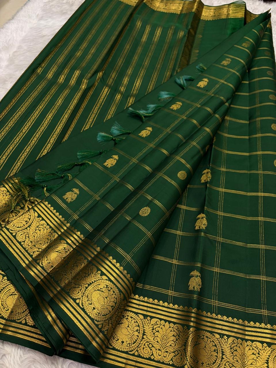 Kancheepuram silk saree full view bottle green body with gold border